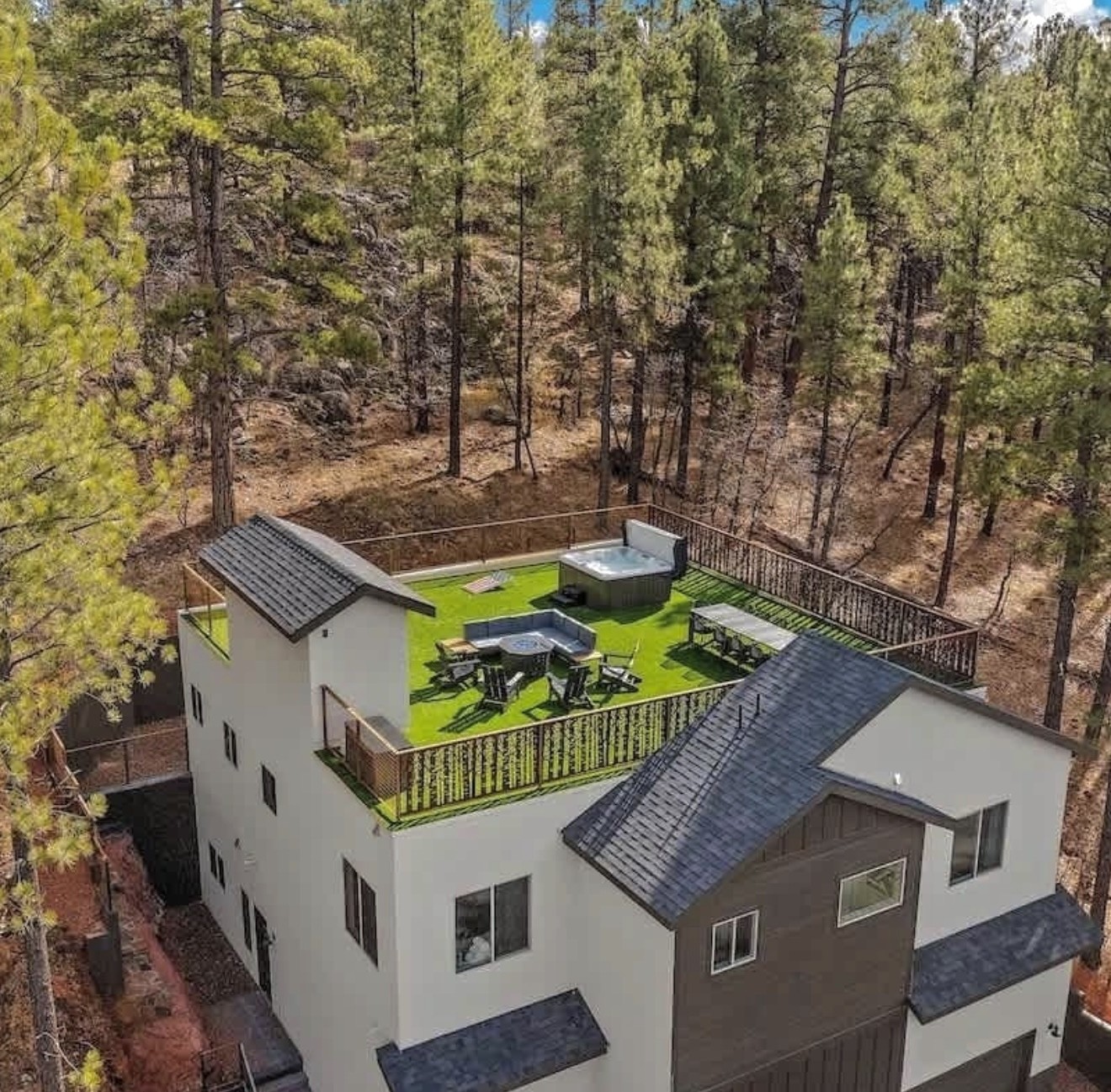 Aerial view of the villa and its private rooftop deck
